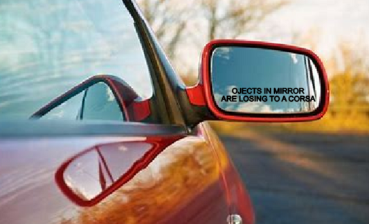 Objects In This Mirror Are Losing To A Corsa Decal