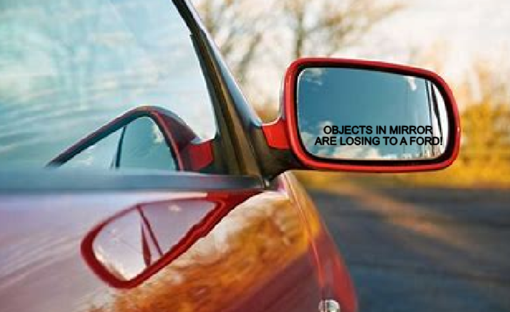 Objects In This Mirror Are Losing To A Ford Decal